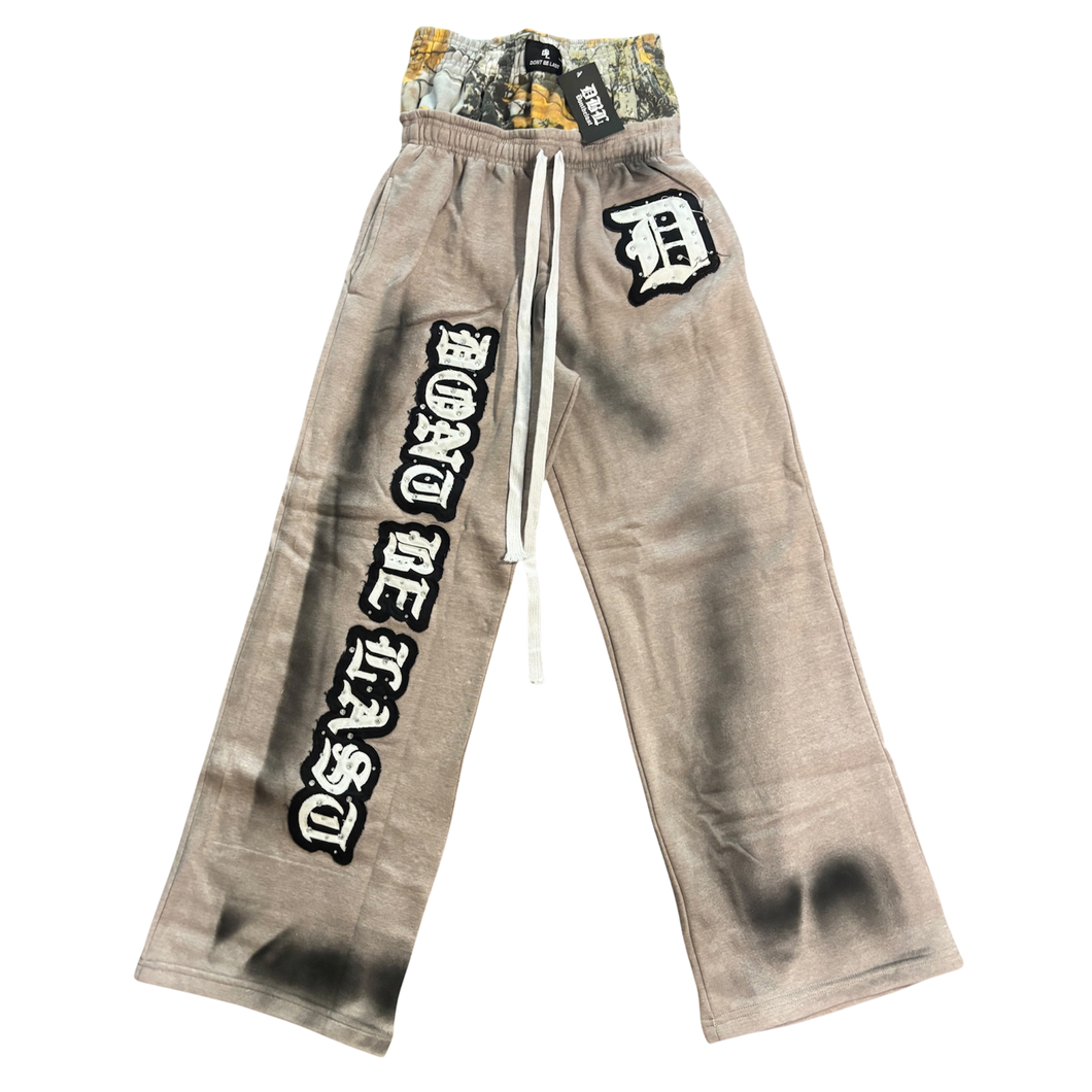 Grey sweat pants with double real tree camo layer matches the zip up